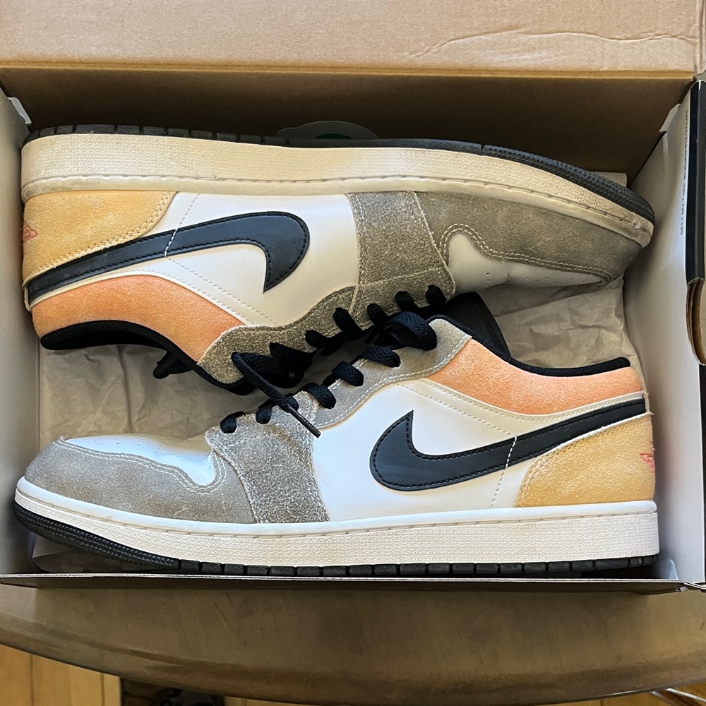 Air Jordan 1’s Black/Magic Ember-Sundial-White.